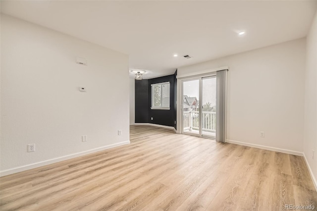 3200 S Federal Blvd Unit 5, Denver, CO 80236 - empty room featuring light wood-style floors and recessed lighting
