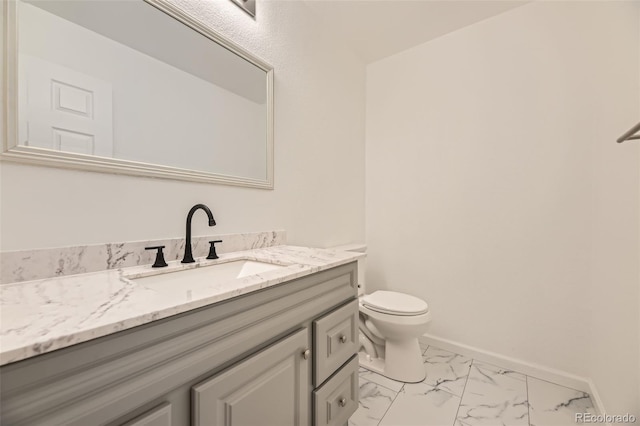 3200 S Federal Blvd Unit 5, Denver, CO 80236 - half bathroom with vanity and marble look tiles