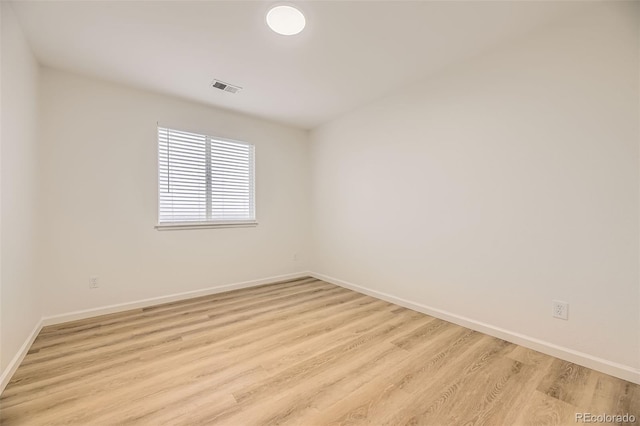 3200 S Federal Blvd Unit 5, Denver, CO 80236 - spare room with light wood-type flooring and baseboards