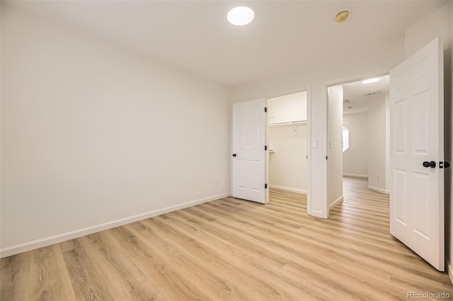 3200 S Federal Blvd Unit 5, Denver, CO 80236 - unfurnished bedroom with light wood-type flooring