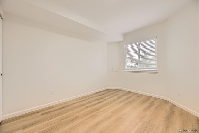 3200 S Federal Blvd Unit 5, Denver, CO 80236 - empty room featuring baseboards and light wood finished floors