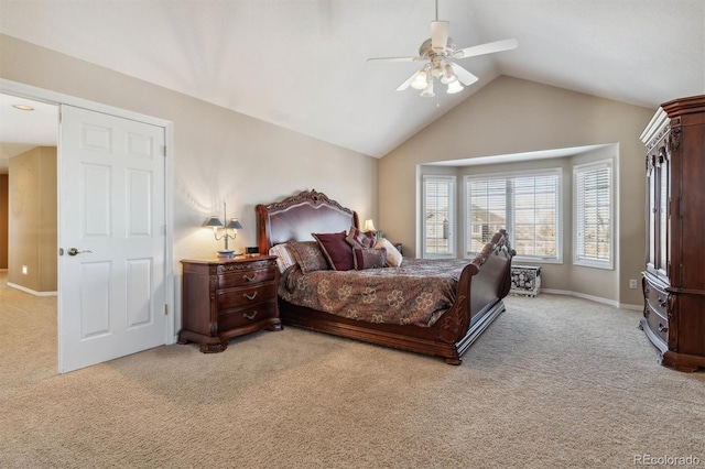 carpeted bedroom with ceiling fan and lofted ceiling