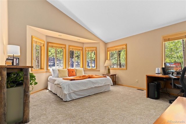 bedroom with lofted ceiling, carpet, visible vents, and baseboards