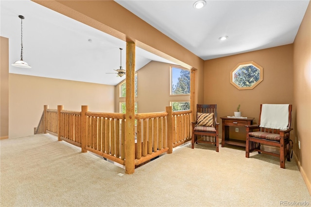 sitting room featuring ceiling fan, carpet flooring, an upstairs landing, and recessed lighting