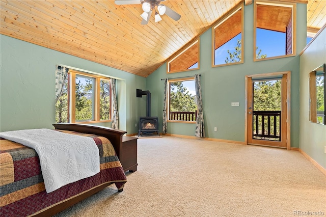 carpeted bedroom with wood ceiling, multiple windows, and baseboards