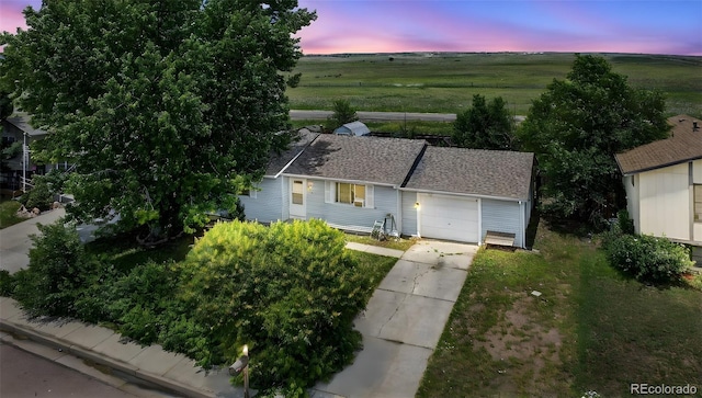 6545 Brook Forest Dr, Colorado Springs, CO 80911 - aerial view at dusk