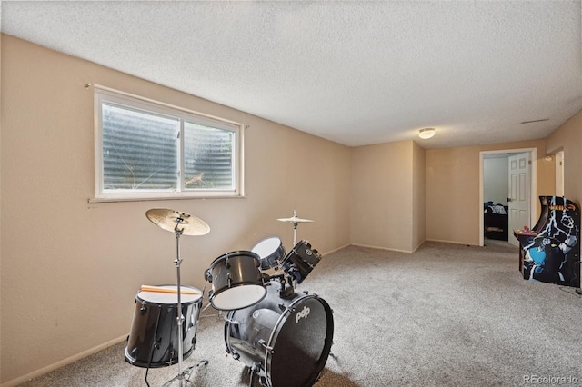 6545 Brook Forest Dr, Colorado Springs, CO 80911 - playroom with a textured ceiling and carpet