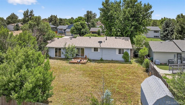 6545 Brook Forest Dr, Colorado Springs, CO 80911 - rear view of property with a residential view and a wooden deck