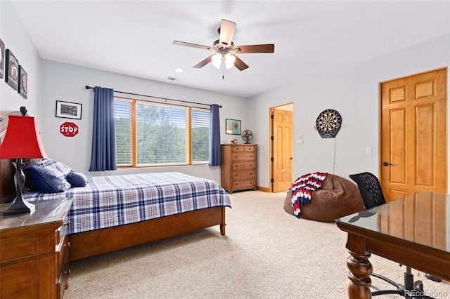 carpeted bedroom featuring ceiling fan