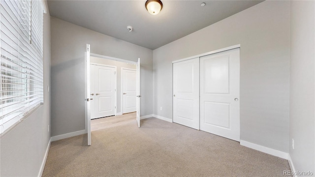 6799 Navajo St, Denver, CO 80221 - unfurnished bedroom featuring light carpet and a closet