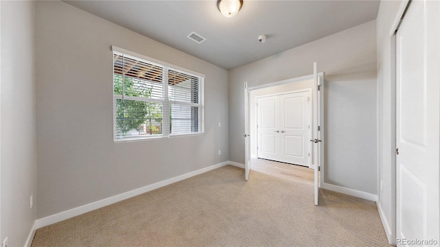 6799 Navajo St, Denver, CO 80221 - unfurnished bedroom featuring light carpet and a closet
