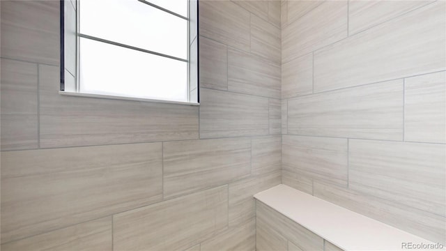 6799 Navajo St, Denver, CO 80221 - full bathroom featuring a tile shower