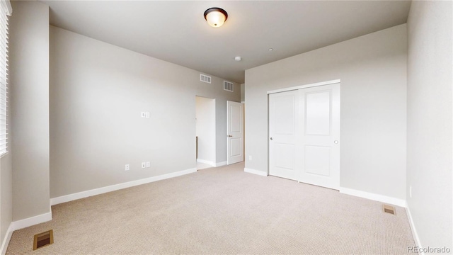 6799 Navajo St, Denver, CO 80221 - unfurnished bedroom featuring light colored carpet and a closet
