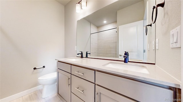 6799 Navajo St, Denver, CO 80221 - full bathroom with double vanity and tiled shower