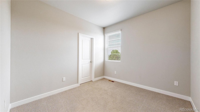 6799 Navajo St, Denver, CO 80221 - empty room featuring light colored carpet