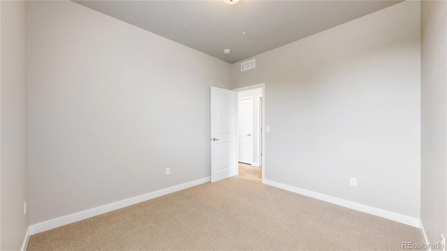 6799 Navajo St, Denver, CO 80221 - empty room with light carpet and baseboards