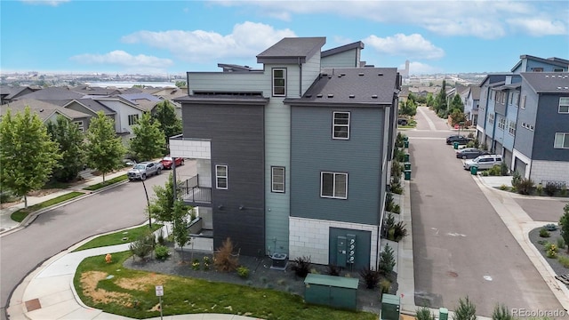 6799 Navajo St, Denver, CO 80221 - view of side of property with a residential view