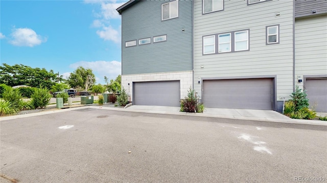 6799 Navajo St, Denver, CO 80221 - view of home's exterior featuring an attached garage