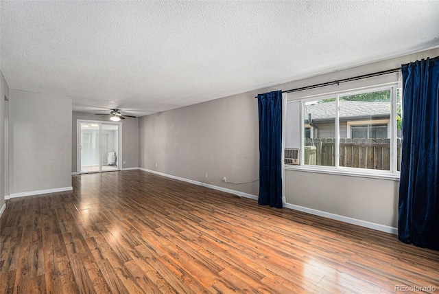 2308 Lima St, Aurora, CO 80010 - empty room with a textured ceiling, wood finished floors, and a ceiling fan