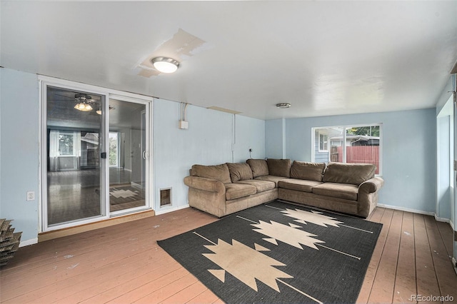 2308 Lima St, Aurora, CO 80010 - living area with hardwood / wood-style flooring and baseboards