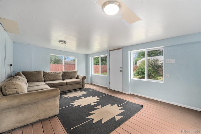 2308 Lima St, Aurora, CO 80010 - living area featuring hardwood / wood-style floors
