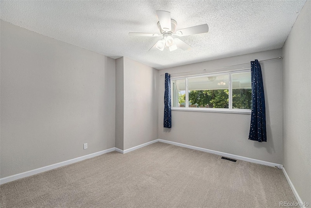 2308 Lima St, Aurora, CO 80010 - carpeted spare room with a ceiling fan and a textured ceiling