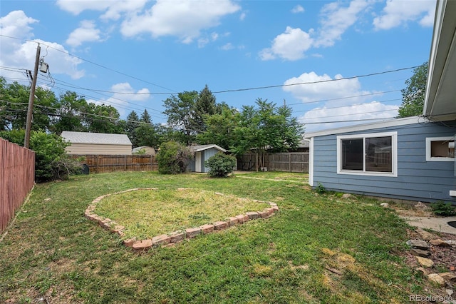 2308 Lima St, Aurora, CO 80010 - fenced backyard with a storage shed