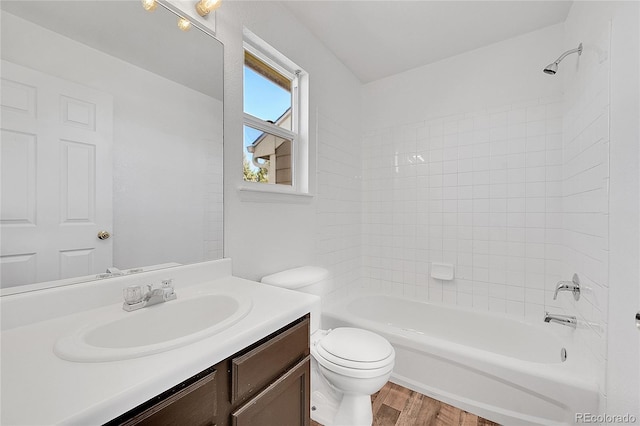 full bathroom featuring shower / bathtub combination, toilet, wood finished floors, and vanity