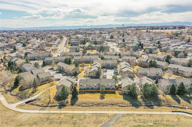 drone / aerial view with a mountain view and a residential view