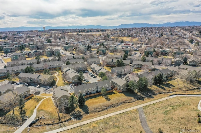 aerial view with a mountain view and a residential view