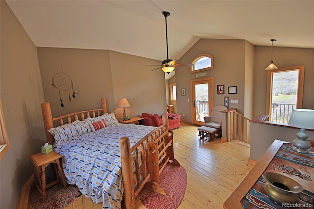 53315 Bull Basin Rd, Mesa, CO 81643 - bedroom with wood-type flooring, access to exterior, lofted ceiling, and ceiling fan