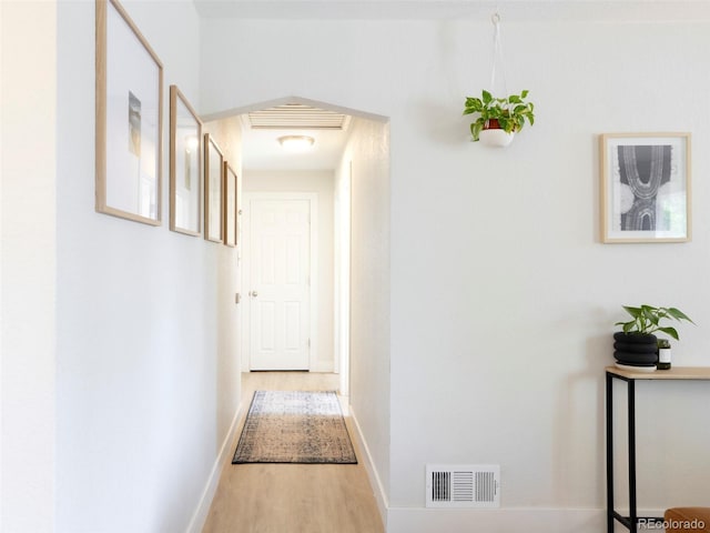 1749 Havana St, Aurora, CO 80010 - corridor with wood finished floors and baseboards