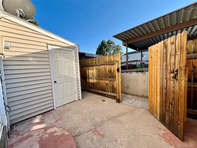 view of patio / terrace featuring a shed