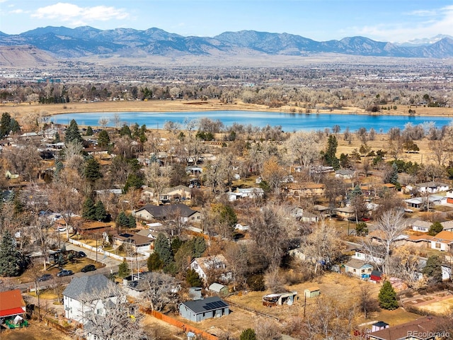 bird's eye view featuring a water and mountain view