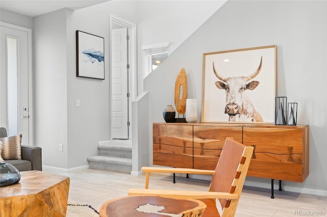 sitting room featuring light hardwood / wood-style floors