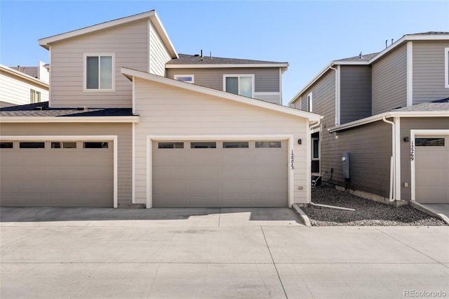 view of front facade with concrete driveway