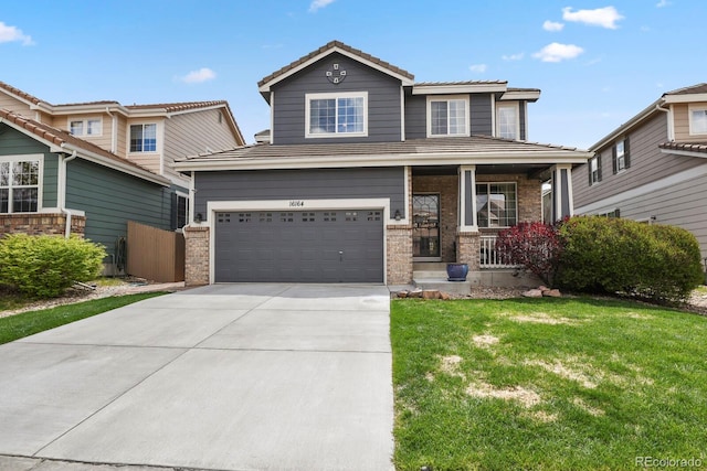 16164 E Hinsdale Ave, Aurora, CO 80016 - view of front of property with an attached garage, a tile roof, a front lawn, a porch, and driveway