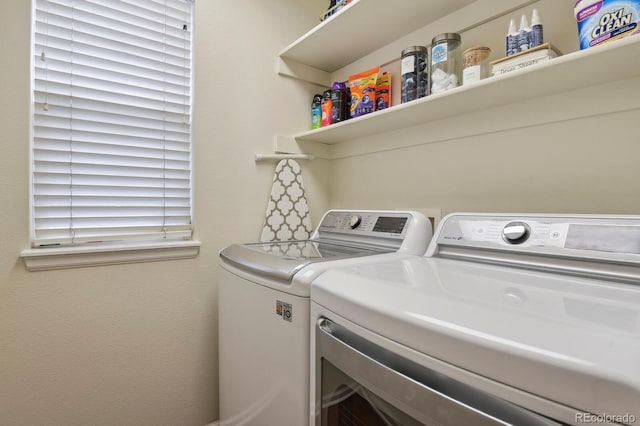 16164 E Hinsdale Ave, Aurora, CO 80016 - laundry room featuring washer and dryer and laundry area