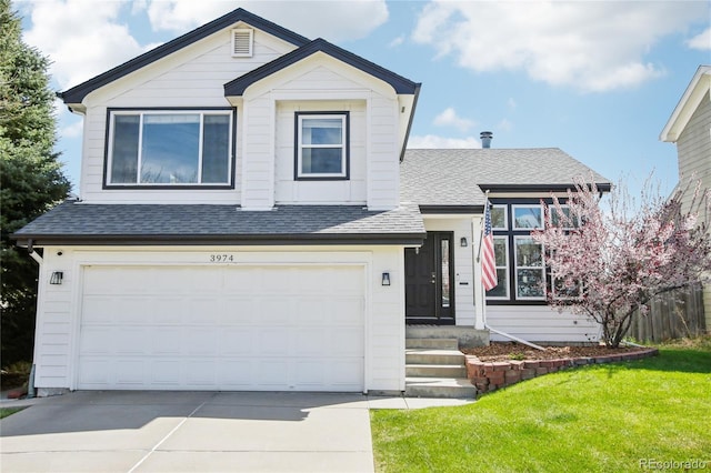 3974 Cambridge Ave, Broomfield, CO 80020 - view of front of house featuring an attached garage, roof with shingles, fence, and driveway