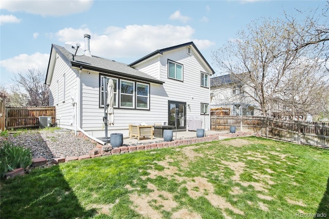 3974 Cambridge Ave, Broomfield, CO 80020 - rear view of property with central air condition unit, a yard, a patio area, and a fenced backyard