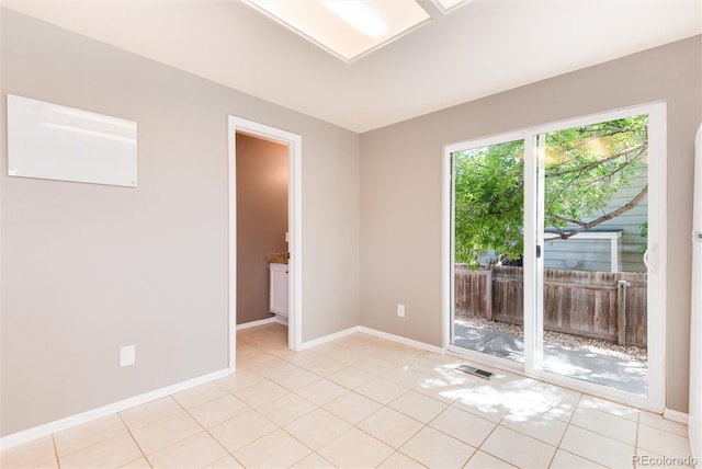 empty room featuring light tile patterned floors