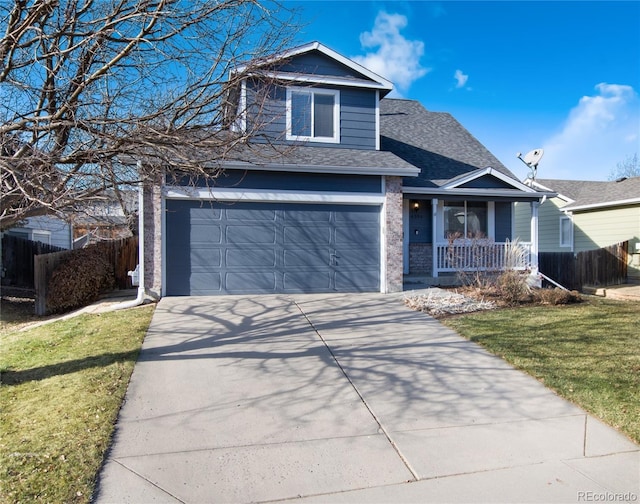 front of property with a front lawn, covered porch, and a garage