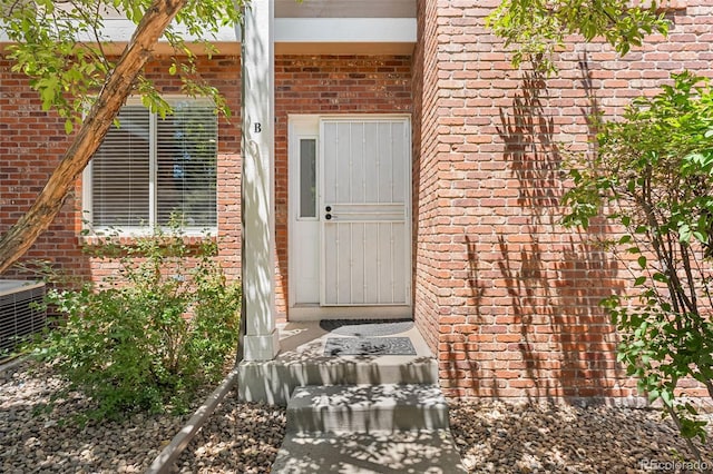 7600 W Coal Mine Ave Unit B, Littleton, CO 80123 - property entrance featuring brick siding
