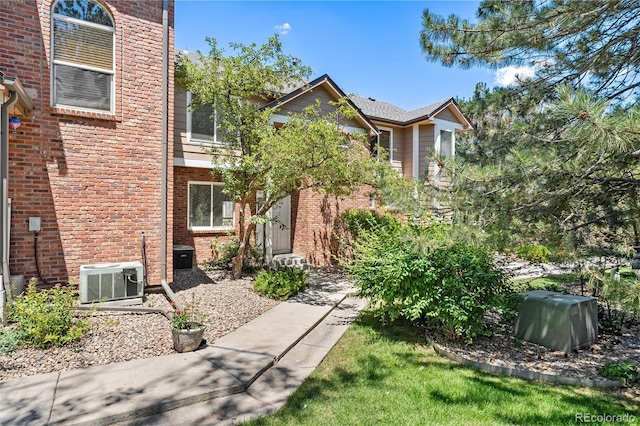 7600 W Coal Mine Ave Unit B, Littleton, CO 80123 - view of front facade with brick siding