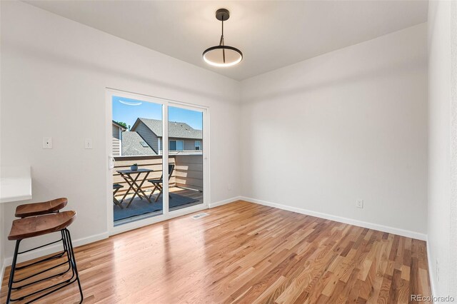 7600 W Coal Mine Ave Unit B, Littleton, CO 80123 - spare room with light wood-style flooring and baseboards