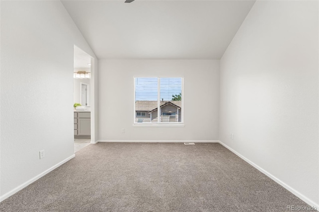 7600 W Coal Mine Ave Unit B, Littleton, CO 80123 - unfurnished room featuring carpet flooring, ceiling fan, and lofted ceiling