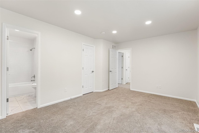 7600 W Coal Mine Ave Unit B, Littleton, CO 80123 - unfurnished bedroom featuring carpet, recessed lighting, and connected bathroom