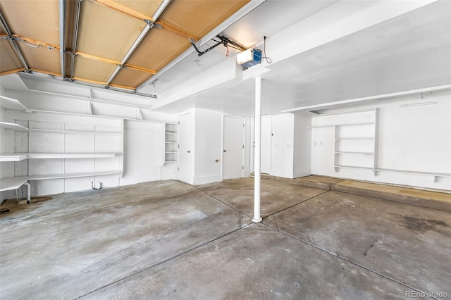 7600 W Coal Mine Ave Unit B, Littleton, CO 80123 - garage featuring a garage door opener