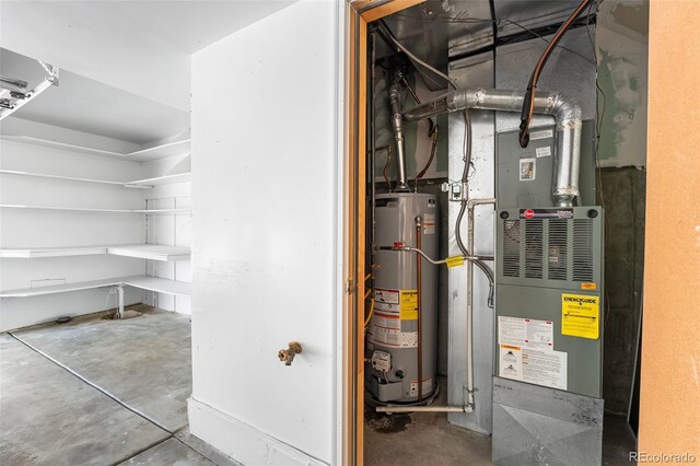 7600 W Coal Mine Ave Unit B, Littleton, CO 80123 - utility room featuring gas water heater and heating unit