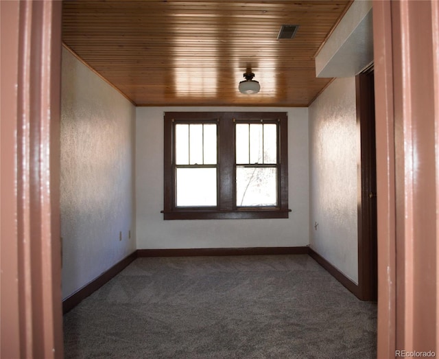 136 Cave Ave, Manitou Springs, CO 80829 - carpeted spare room featuring a textured wall and wooden ceiling